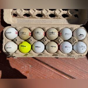 12 Assorted brand golf balls